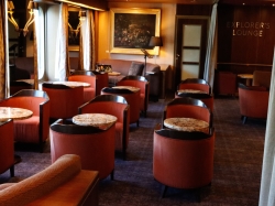 Westerdam Explorers Lounge picture Uploaded in 2023 Photo courtesy of Neal Bruder. Westerdam Explorers Lounge picture